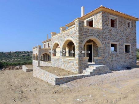 Brand new unfinished nature stone houses near Evangalismos